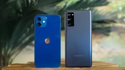 Two smartphones side by side for comparing security apps